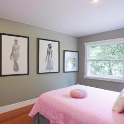 This bedroom creates a serene atmosphere with a gallery wall of female form artwork.