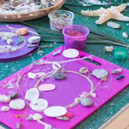 DIY crafts like sand art and seashell necklaces are a fun and creative way to incorporate the beach into Kookaburra Coast VBS.