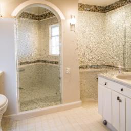 The intricate mosaic tile floor adds a pop of color to this contemporary bathroom.