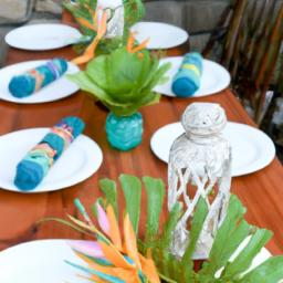 Transport your guests to a tropical paradise with this vibrant and festive tablescape