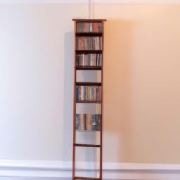 Maximize your vertical space by adding a tall bookshelf to store and display your favorite books and decorative items.